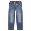 Blue jeans on a light gray background