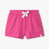 Pink shorts with a white bow