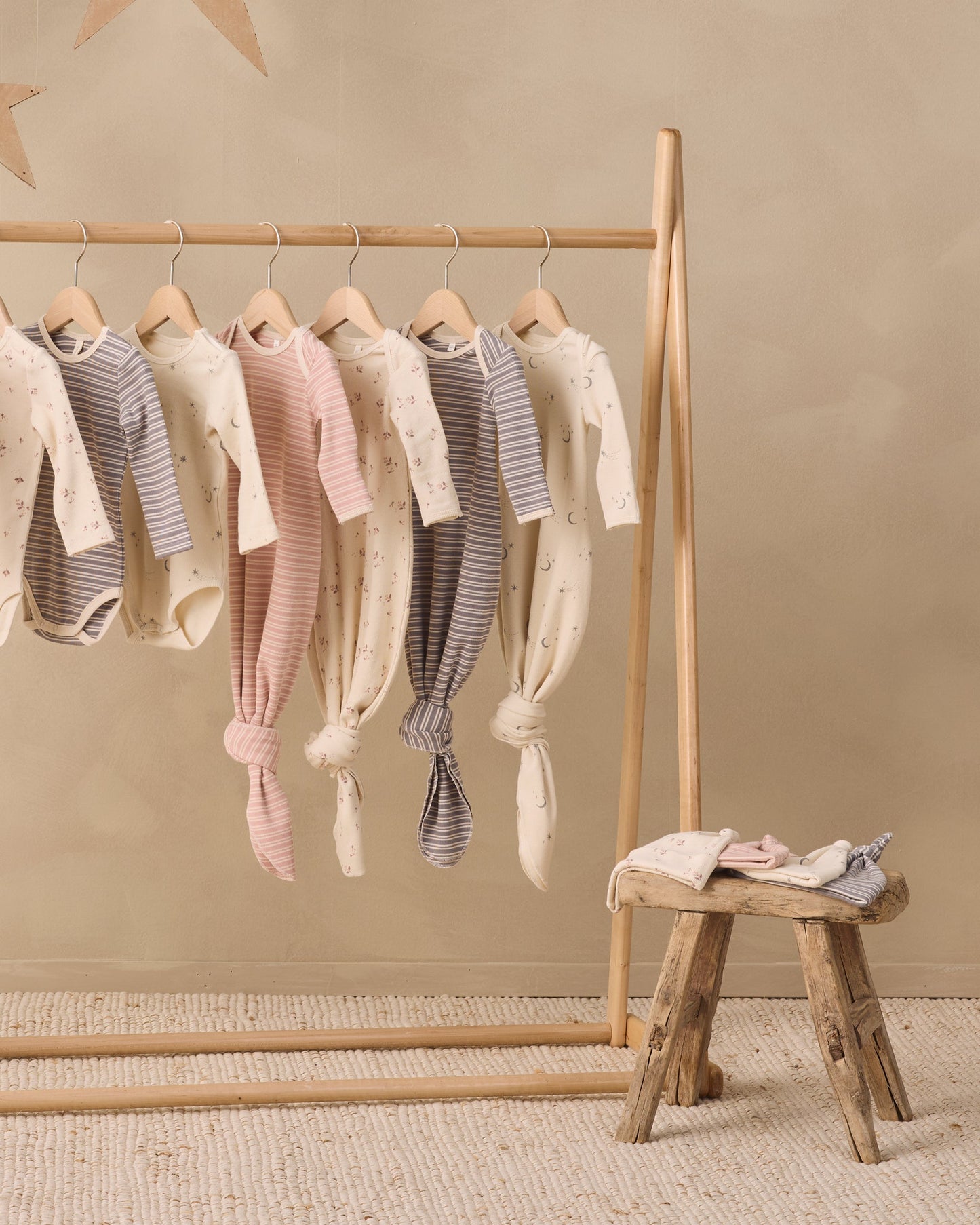 Baby in Rose Microstripe Gown + Hat, lifestyle photo