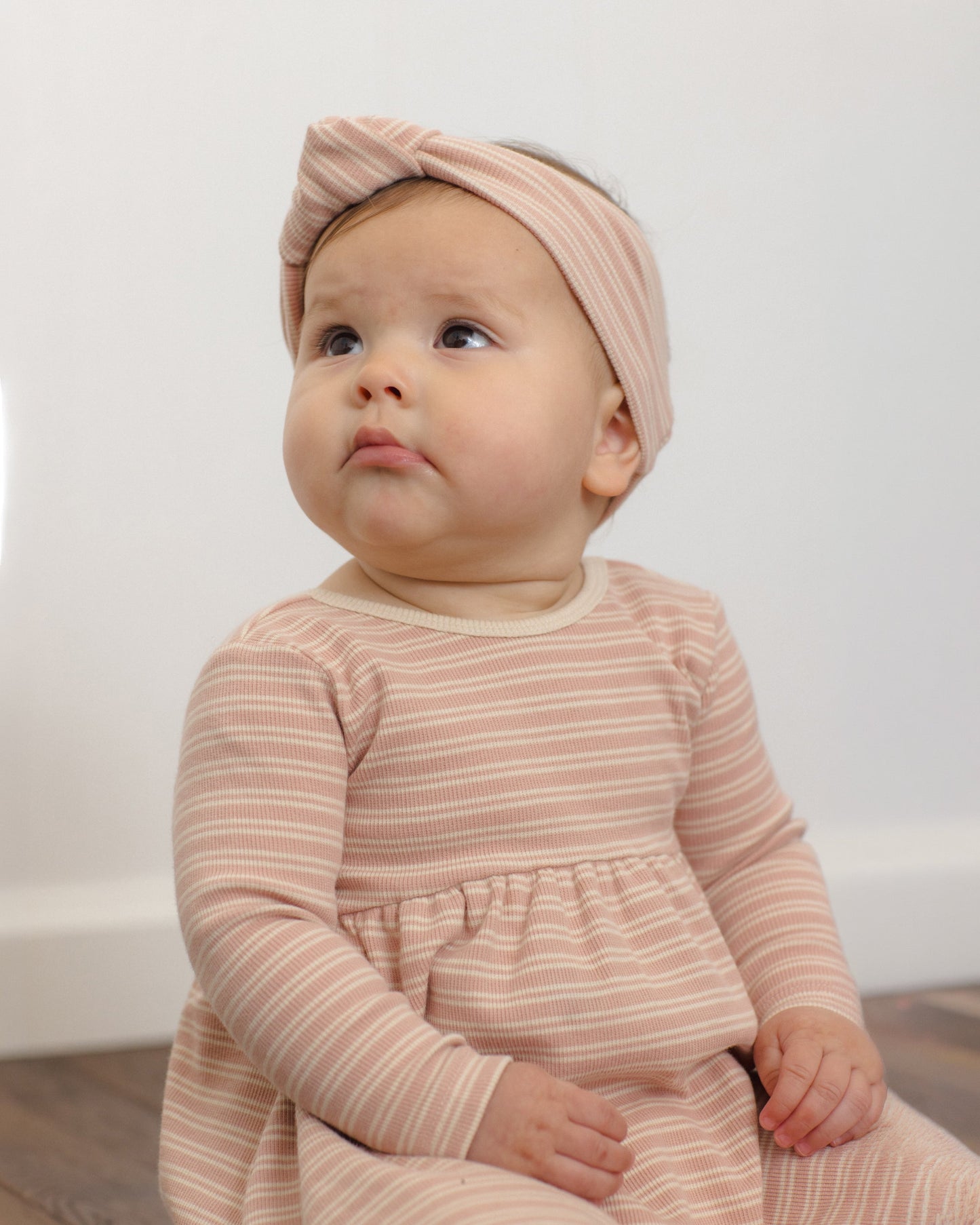 Baby wearing the Rose Microstripe Headband, lifestyle photo