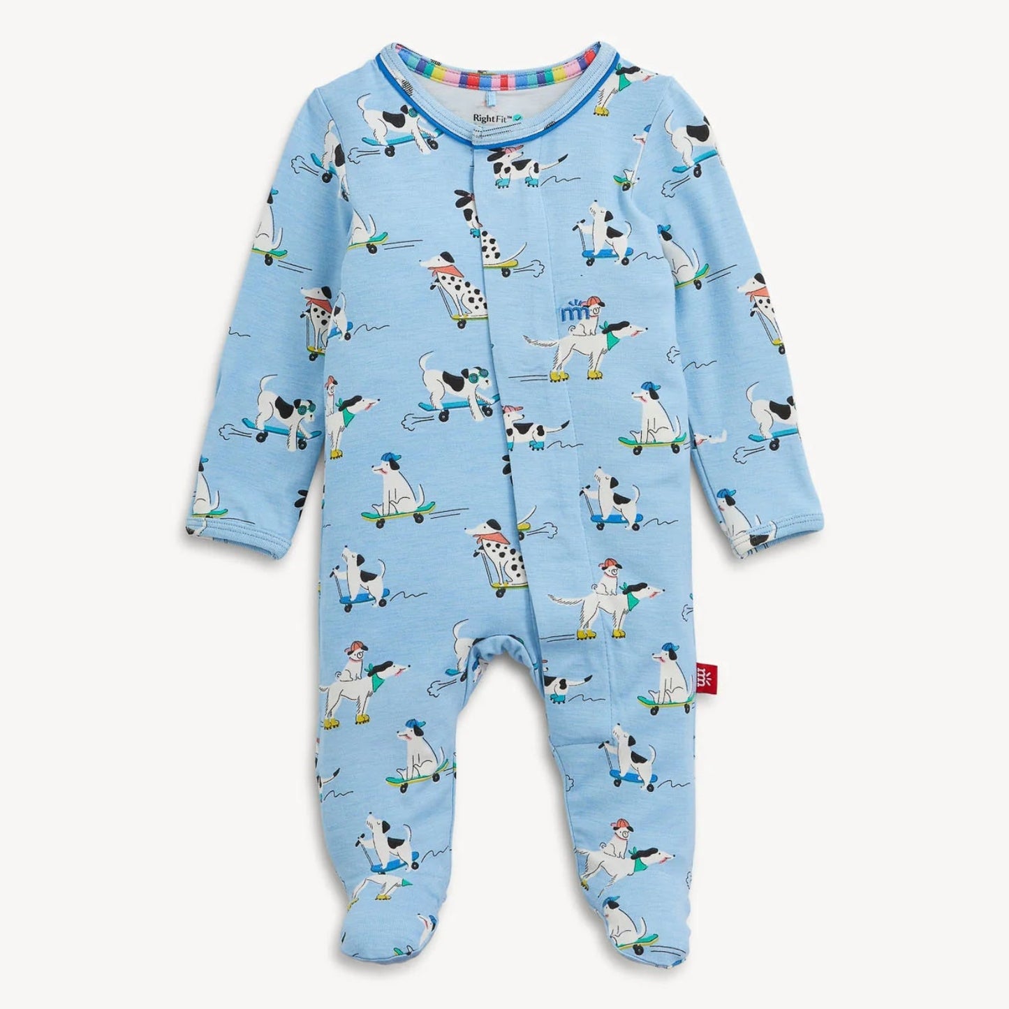 A baby footed sleeper in light blue with an all-over cow print, featuring a snap closure at the neck and a small red tag on the side, shown against a plain off-white background.