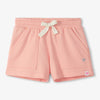 Apricot shorts with a white bow on a light gray background