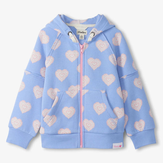 Light blue hoodie with heart patterns on a white background