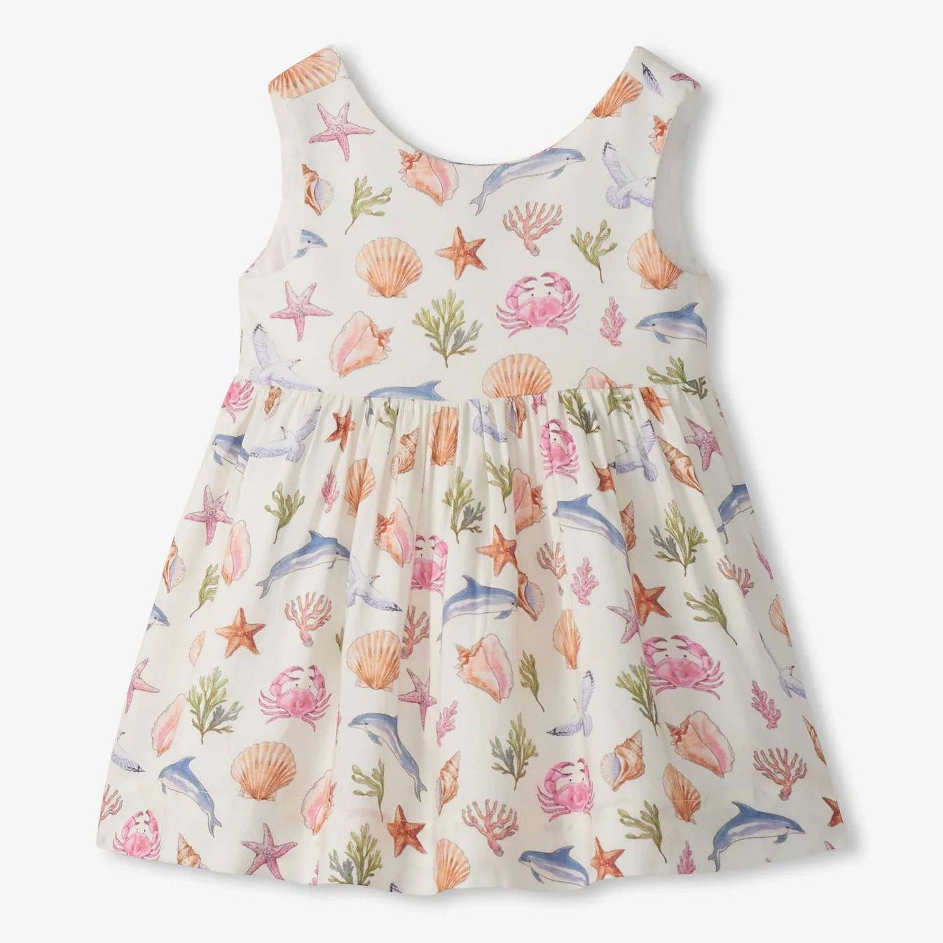 Children's dress with sea-themed print on a white background