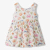 Children's dress with sea-themed print on a white background