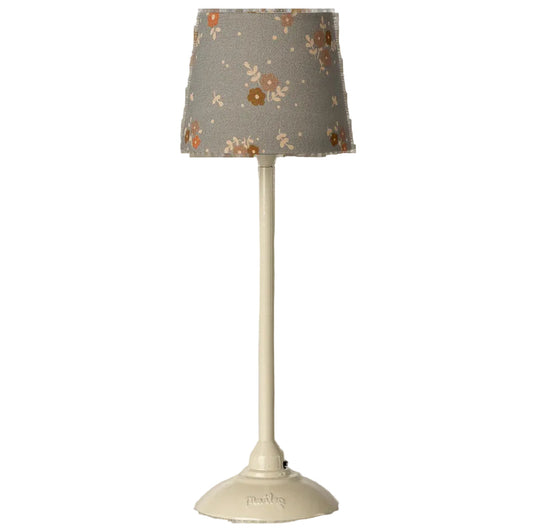 Small table lamp with a floral-patterned shade 
