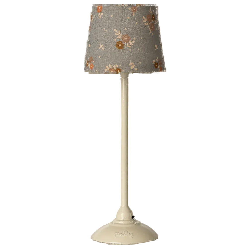 Small table lamp with a floral-patterned shade 