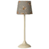 Small table lamp with a floral-patterned shade 