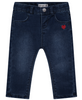 Mid blue denim jeans with an embroidered red heart on the left leg