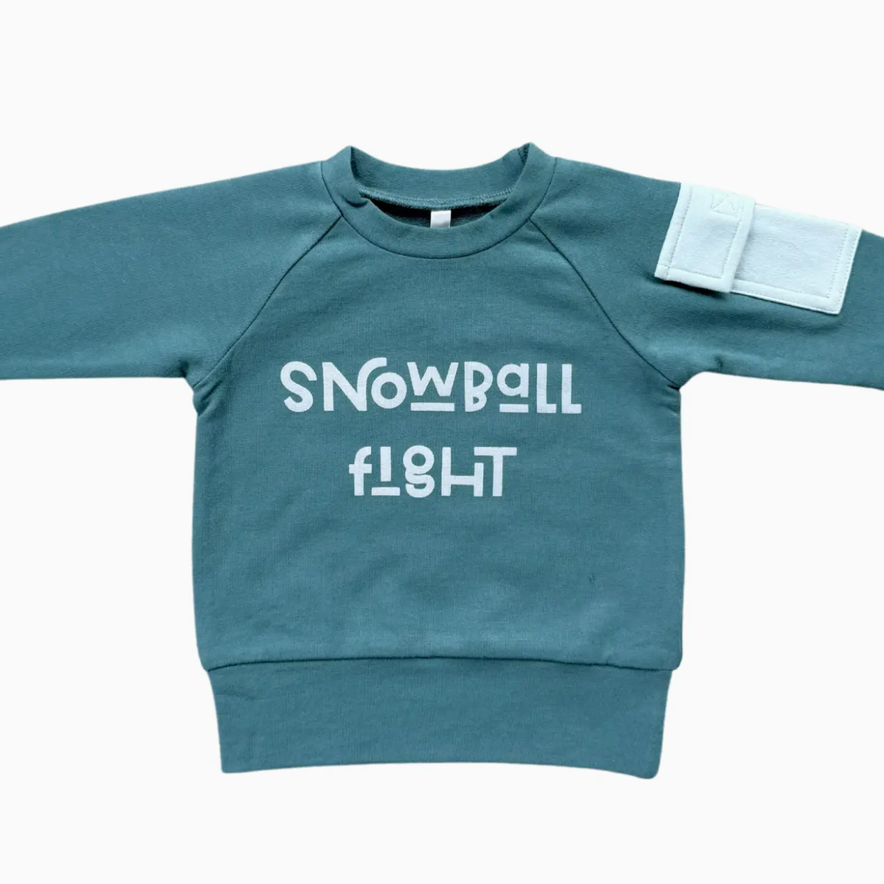 Blue sweatshirt with 'SNOWBALL FLIGHT' text on a white background