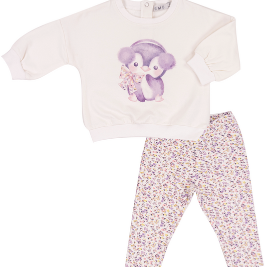 Children's outfit with a white top featuring a purple penguin design and floral-patterned pants on a white background.