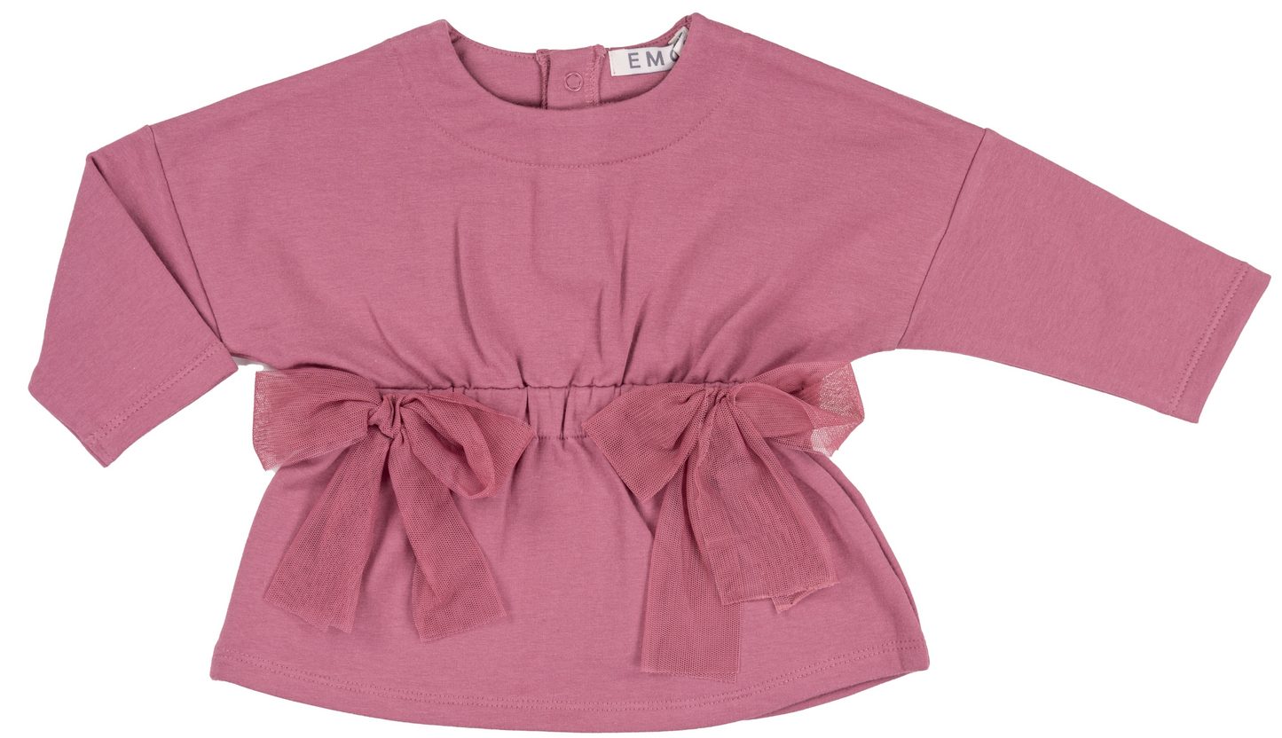 Pink long-sleeve top with a bow detail on a white background