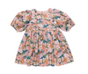 Floral dress with puff sleeves on a white background