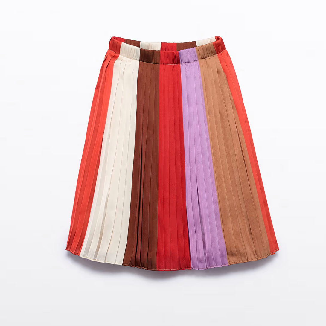 Colorful pleated skirt with vertical stripes on a white background