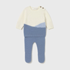Baby outfit with cream top and blue pants on a light gray background