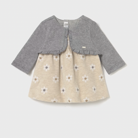 Children's dress with gray cardigan on a light gray background