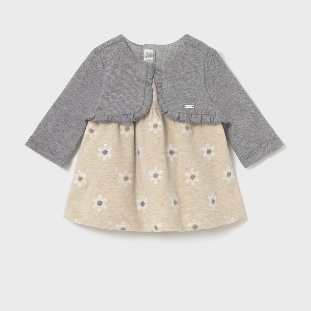 Children's dress with gray cardigan on a light gray background
