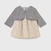 Children's dress with gray cardigan on a light gray background
