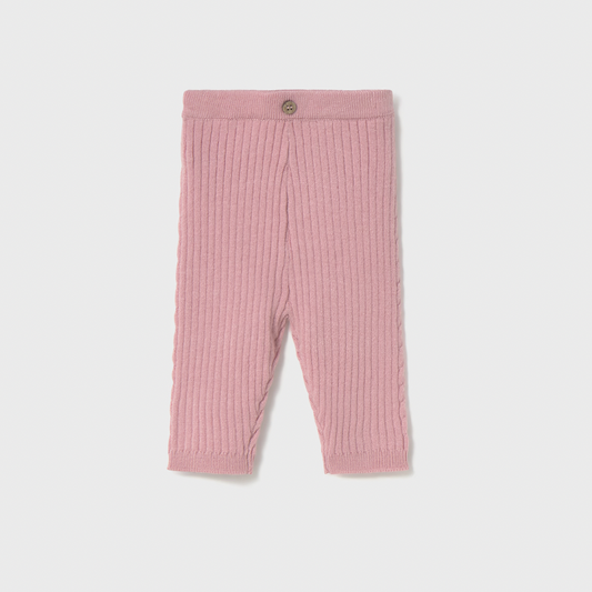 Pink ribbed baby leggings on a light gray background