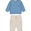 Baby boy's outfit with blue sweatshirt and beige pants on a white background