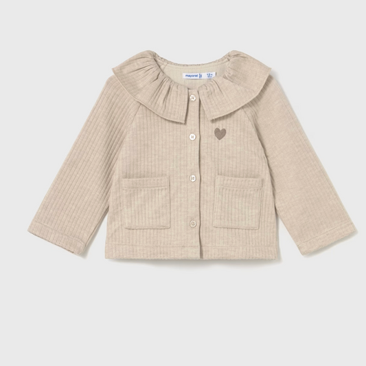 Beige ribbed jacket with a heart design on a white background