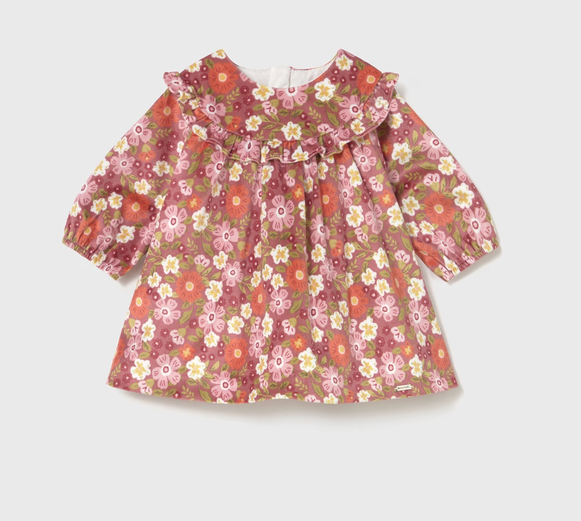 Floral patterned dress on a light gray background