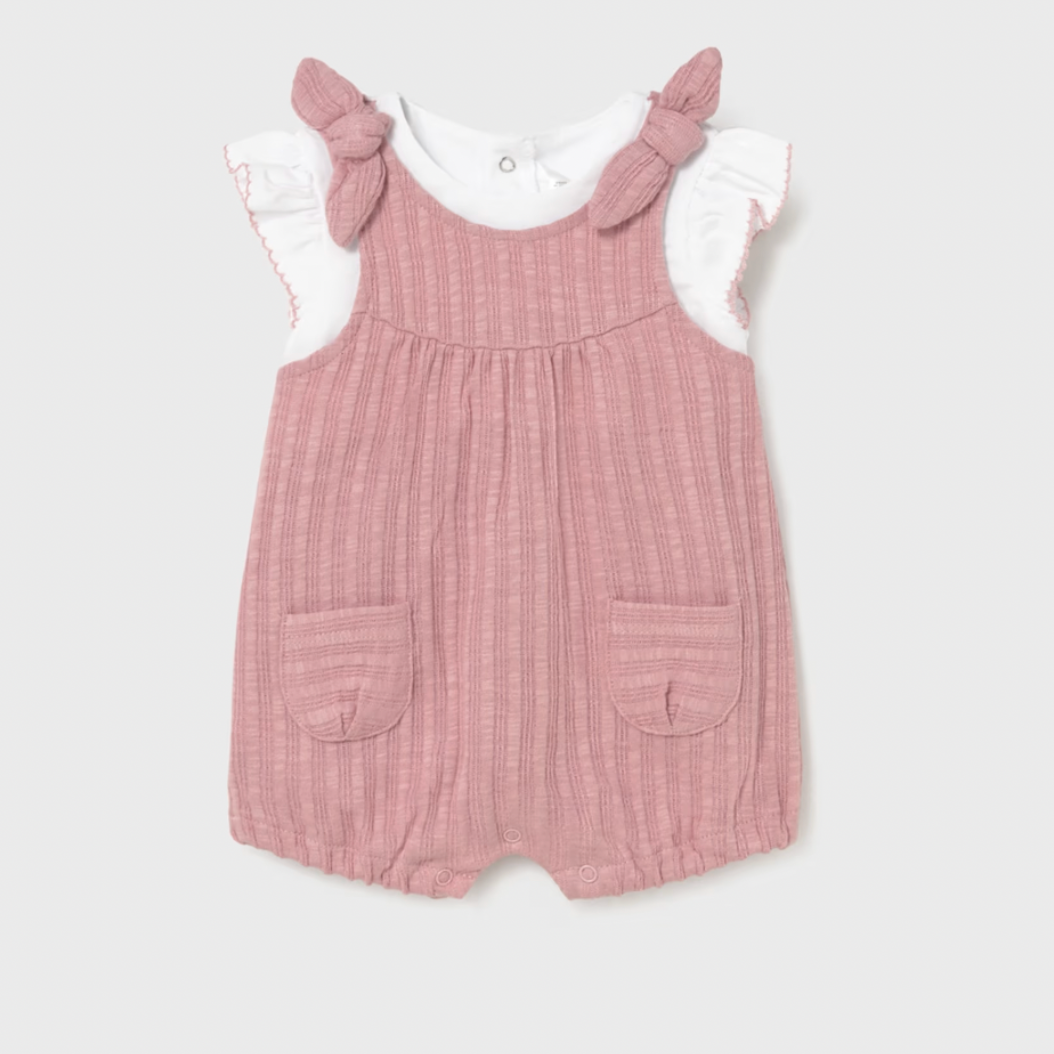 Pink romper with ruffled sleeves on a white background