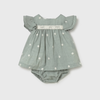 Green baby dress with ruffled sleeves and daisy patterns with a diaper cover. 