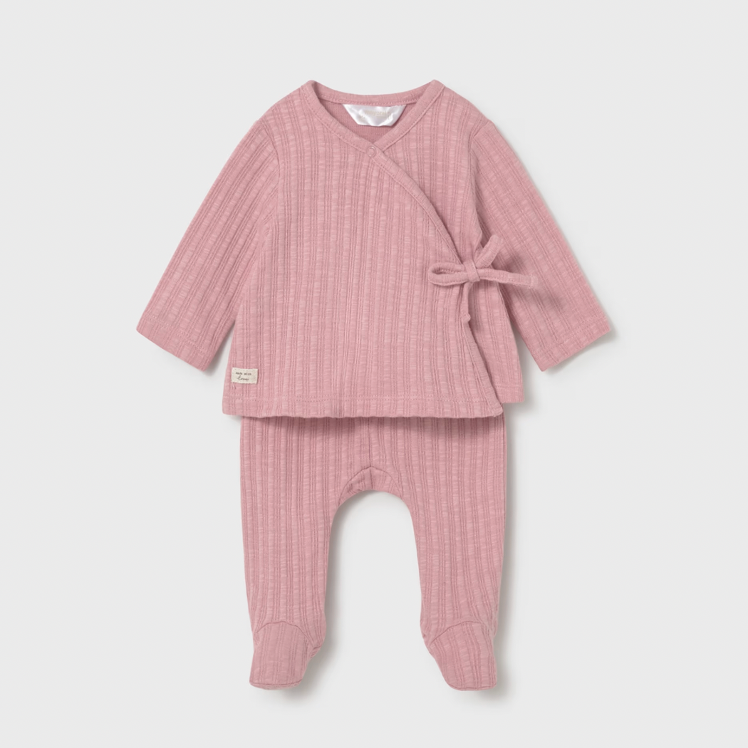 Pink baby outfit with long-sleeve top and pants on a light gray background