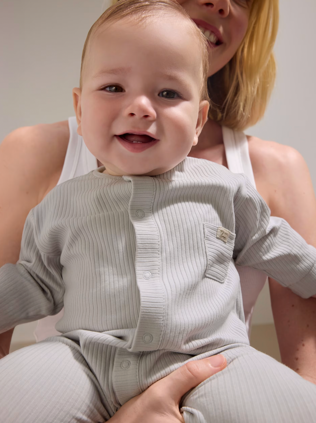 Grey Welcome Romper shown from another angle