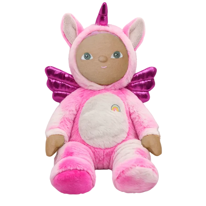 Pink plush toy with fairy wings and a rainbow emblem on a gray background