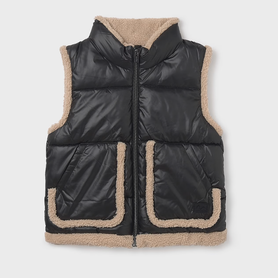 Black puffer vest with beige sherpa lining on a white background
