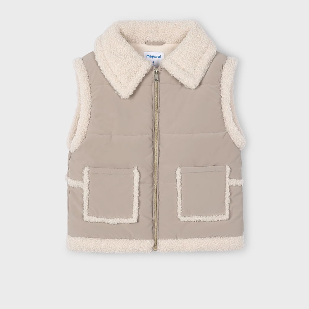 Beige vest with white collar and pockets on a light gray background