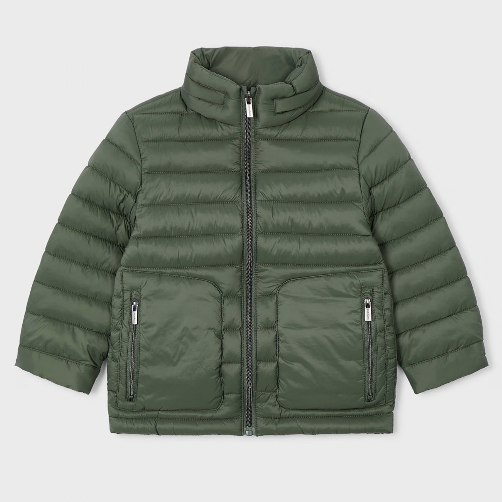 Green puffer jacket on a light gray background
