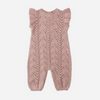 Knitted baby romper with ruffled sleeves on a white background