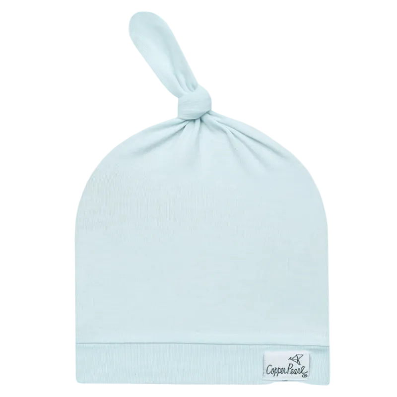 Light blue baby hat with a knot on top on a white background