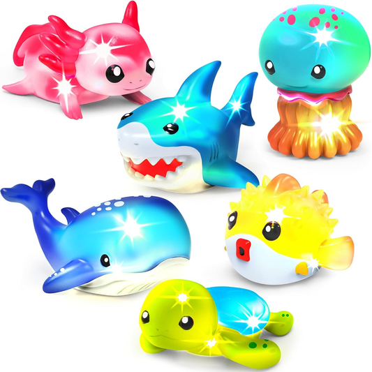 Colorful marine animal bath toys on a white background