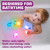 Colorful marine animal bath toys on a white background