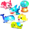 Colorful marine animal bath toys on a white background