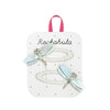Packaged hair accessories with dragonfly designs on a Rockahula branded card.