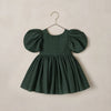 A dark forest green toddler dress with puffy short sleeves and a gathered flared skirt.