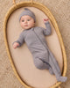 Slate Bamboo Zip Footie, studio photo on baby