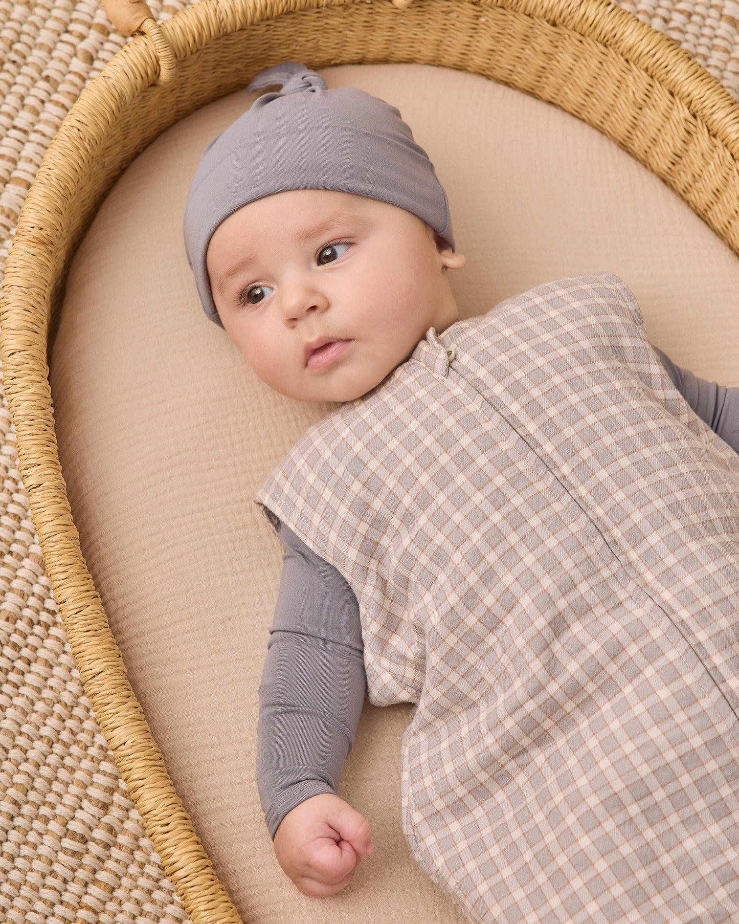 Baby wearing the Slate Knotted Hat by Quincy Mae