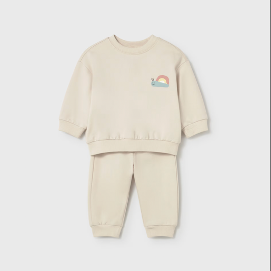 Beige children's sweatshirt and jogger set with a rainbow design 