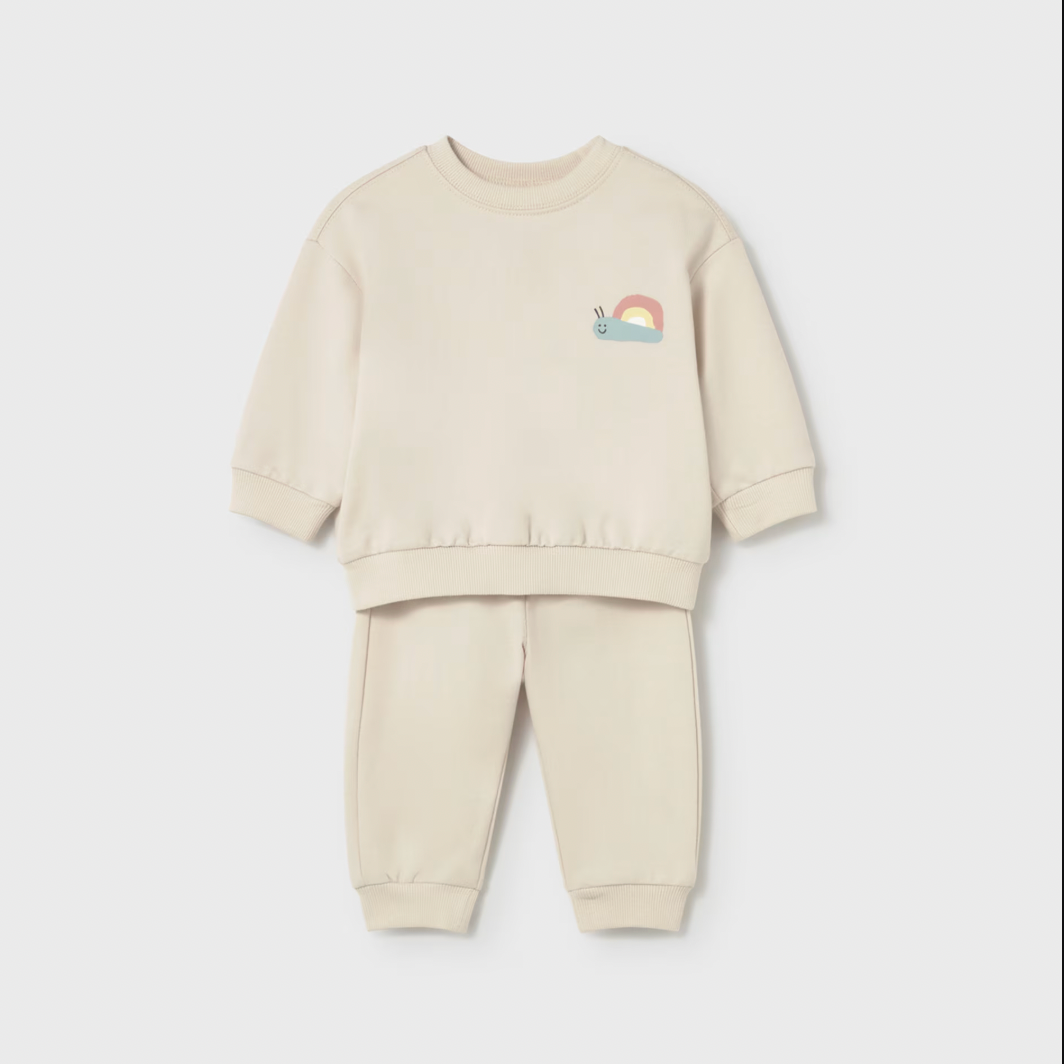 Beige children's sweatshirt and jogger set with a rainbow design 