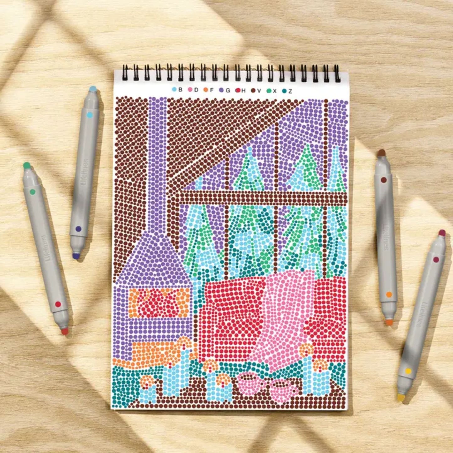 Relaxing winter dot-by-letter activity pad with markers