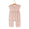 Floral-patterned baby romper on a hanger 