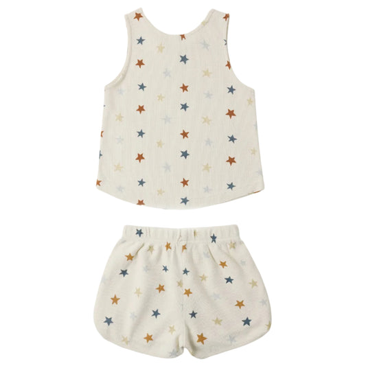Children's sleeveless top and shorts set with star pattern on a white background