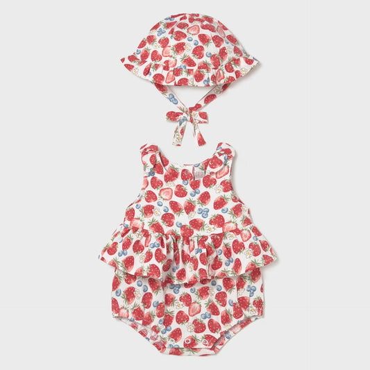 Baby romper and hat set with strawberry pattern on a white background