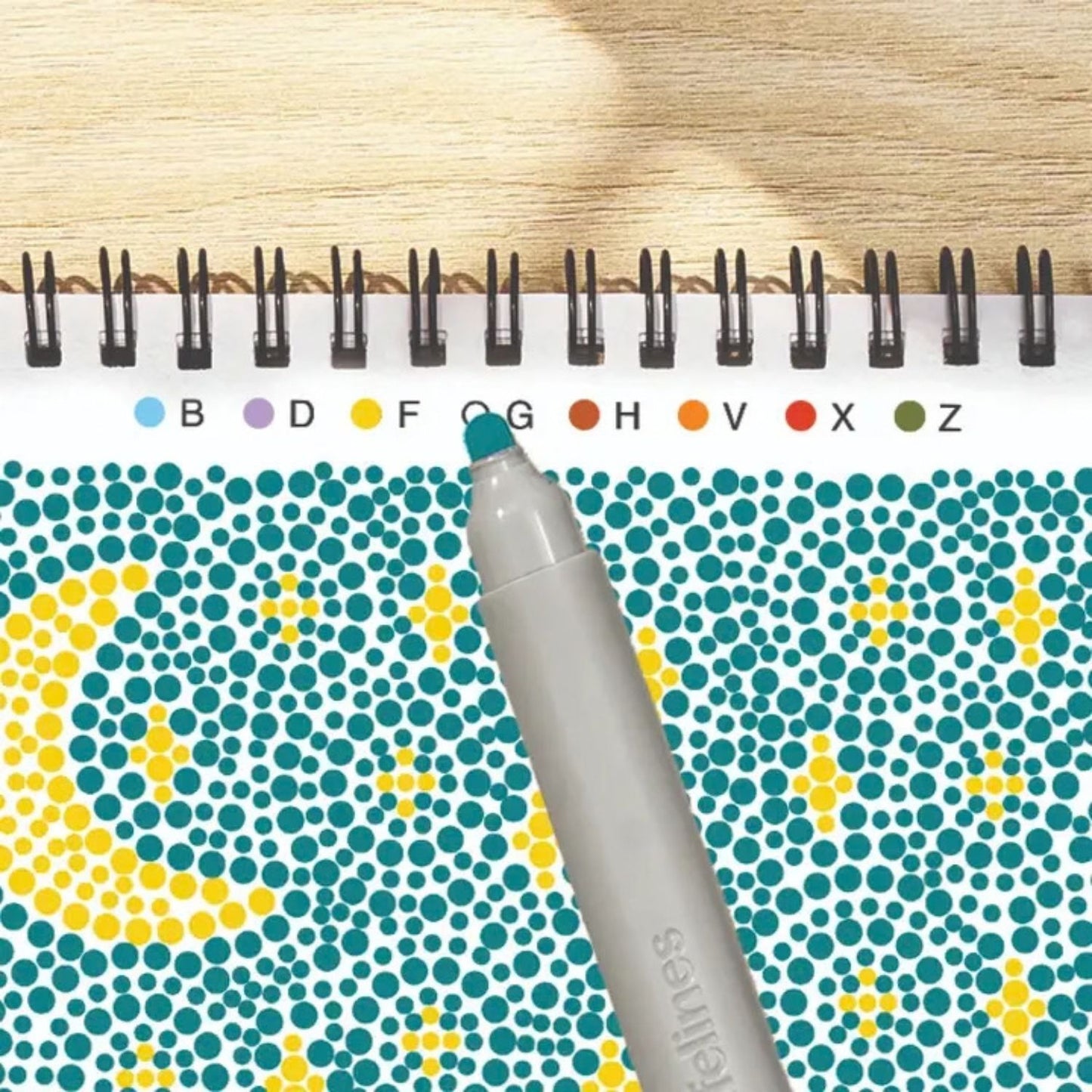 Calming dot-by-letter activity pad with botanical scenes